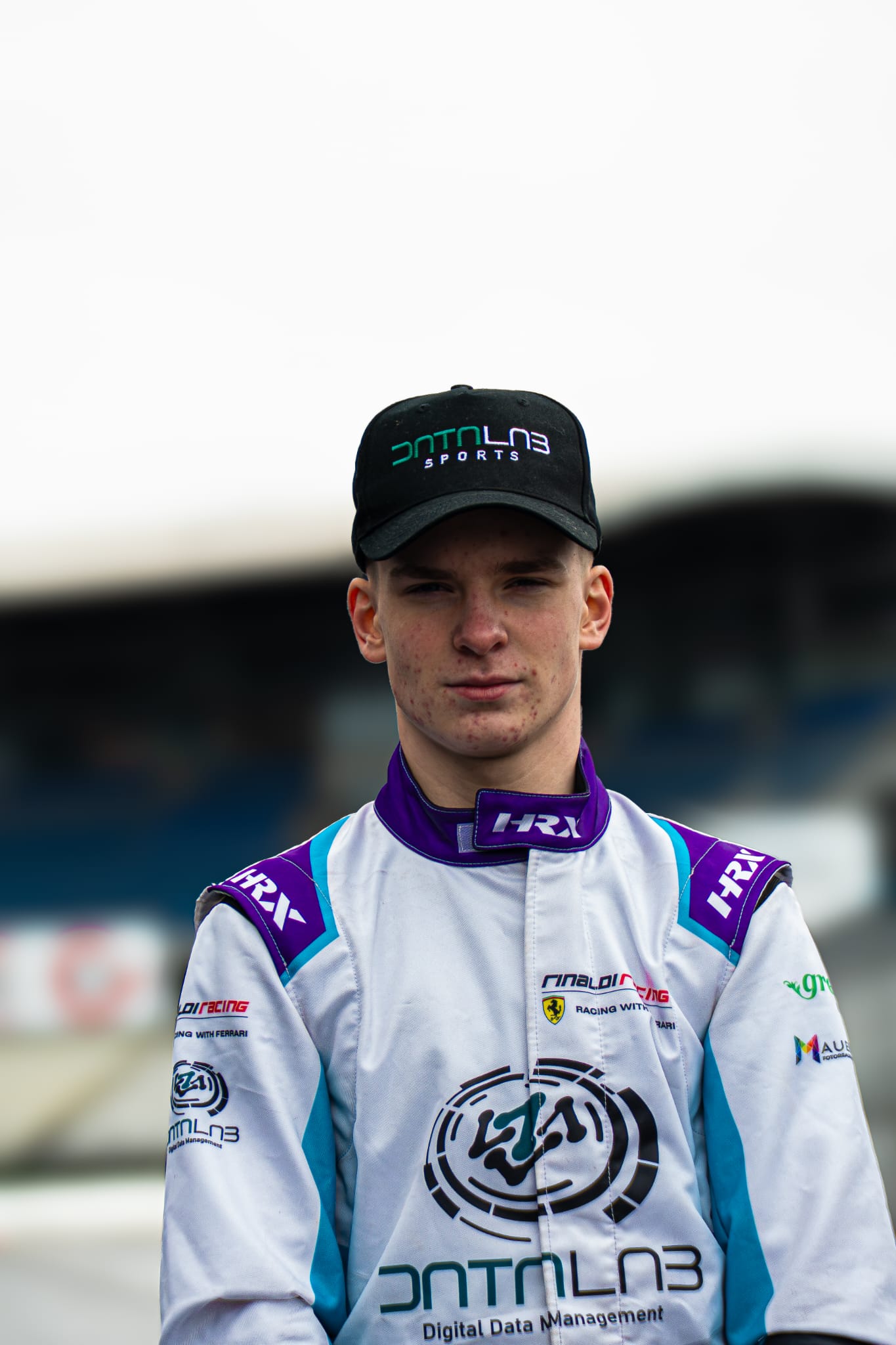 Malte Jaekel in his racing suit at the circuit